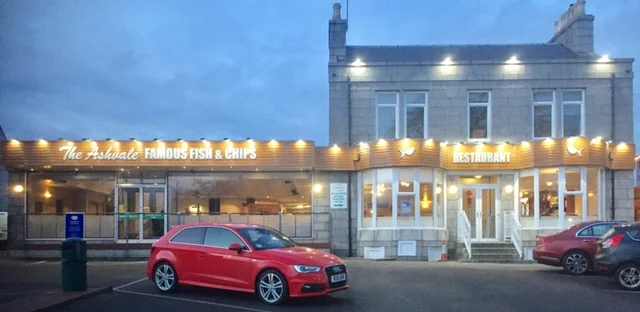 The Ashvale on Great Western Road, Aberdeen, lit up at dusk